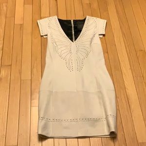 White 100% leather mini dress, perforation detail